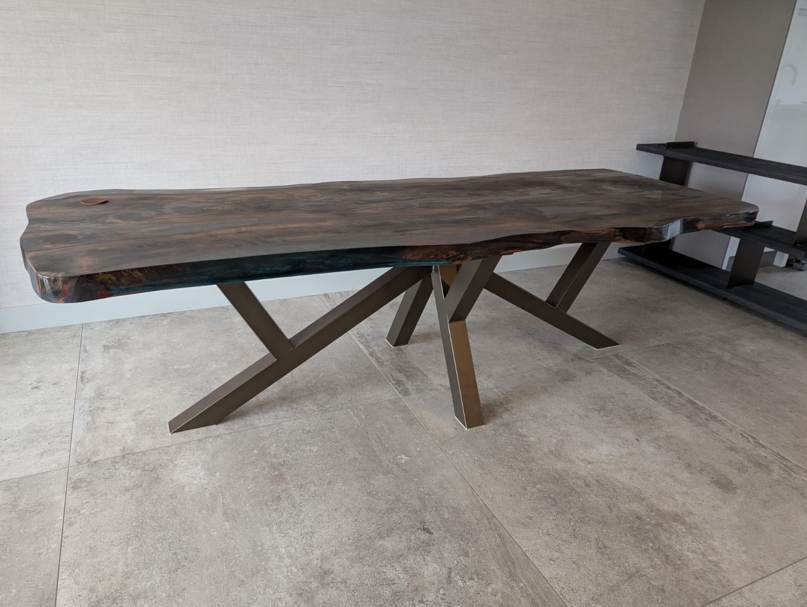 Dark oiled juniper dining table with blue epoxy